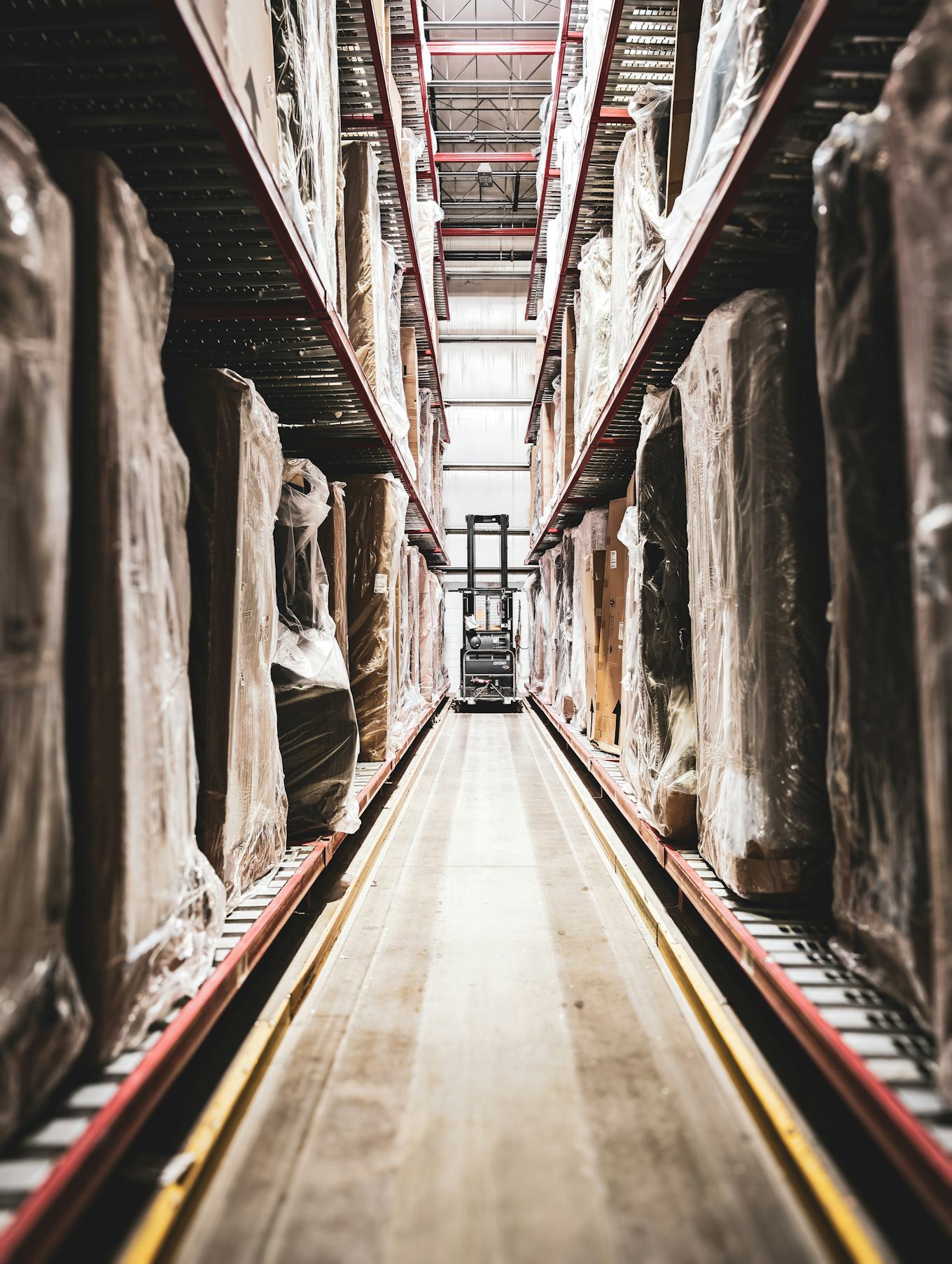 Industrial warehouse racking stocked with materials