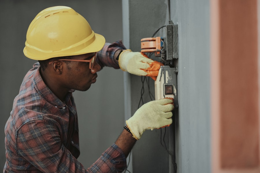 Nexus technician working on an electrical panel